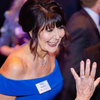 President Philomena Mantella talking to guests